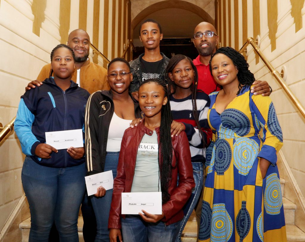 Five lucky local youngsters have each received an all-expenses paid scholarship this year, valued at over R170 000 each, from the Southern Highveld Community Development Trust (SHCDT), a CSI initiative of Graceland Hotel Casino & Country Club, to follow their dreams of obtaining a tertiary education. Here the lucky recipients, in the front, Angel Phakathi, middle, Asakhanya Maseti, Ellen Maseko, Philisiwe Mayaba and at the back, Nhlakanipho Mngomezulu (middle) celebrate this wonderful opportunity with Peermont Human Resources Executive, Fihliwe Molefi (middle right) and two SHCDT Alumni, Mishael Mashele (back left) and Mike Sibeko (back right) at an induction function at Emperors Palace recently. Successful businessmen, Mashele and Sibeko, who attribute much of their success to the opportunities that arose because of the SHCDT scholarships they received, were involved in the selection of the new bursary recipients.    (Photograph by Yolanda van der Stoep)
