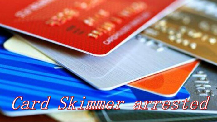 Card skimming delivery man arrested