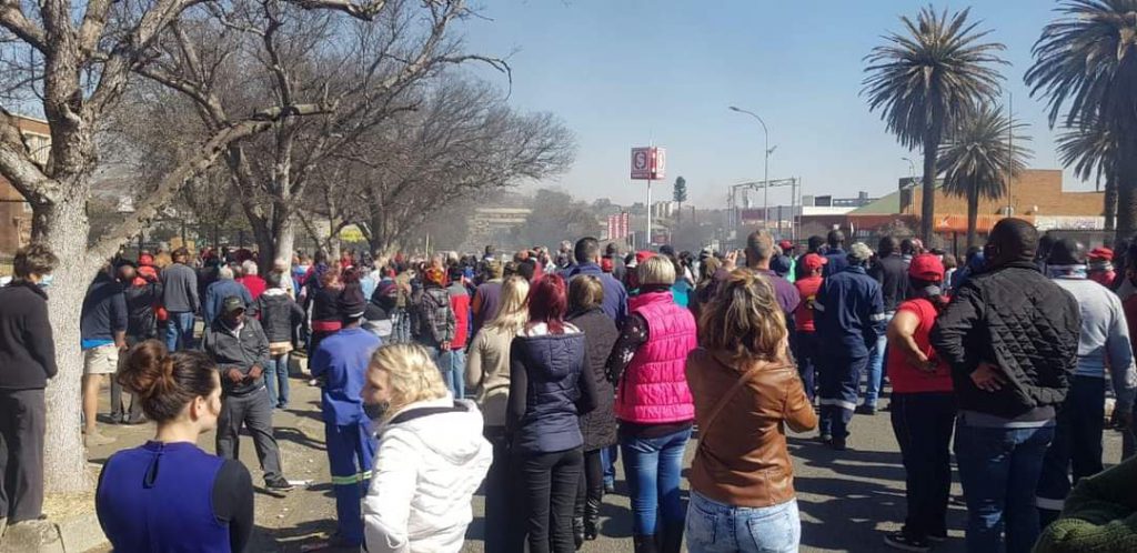 residents and shop owners protest in Lekwa