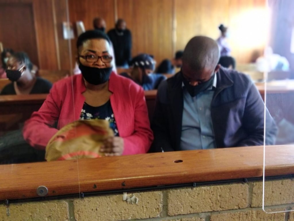 fraud suspects in court